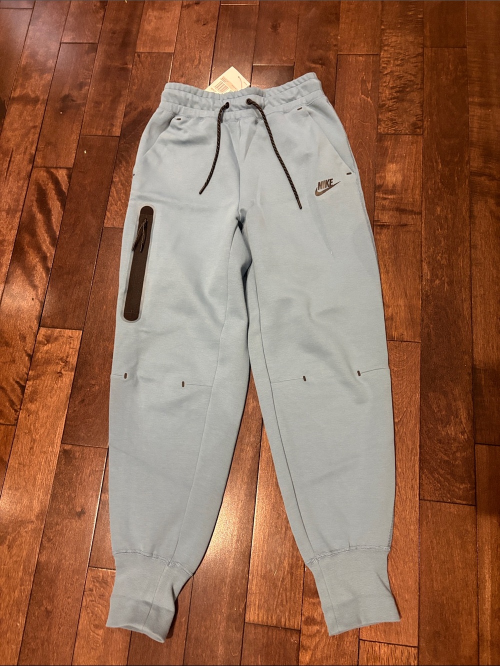 NWT. Nike Women’s Tech Fleece Joggers with Zip Pocket. Light blue colorway. XS